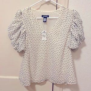 Polka dot blouse with ruffled sleeves